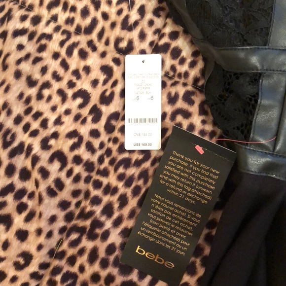 Woman’s black Bebe party dress - Picture 4 of 8